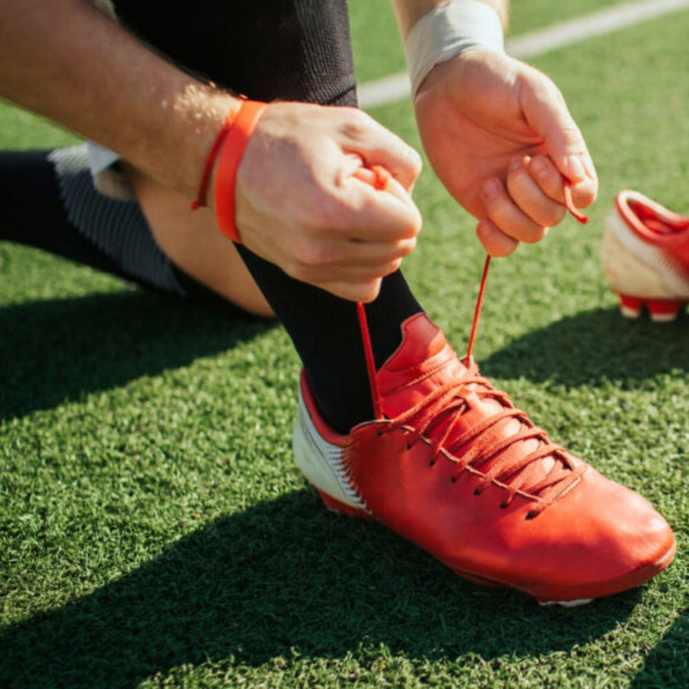 Cách buộc dây giày đá bóng