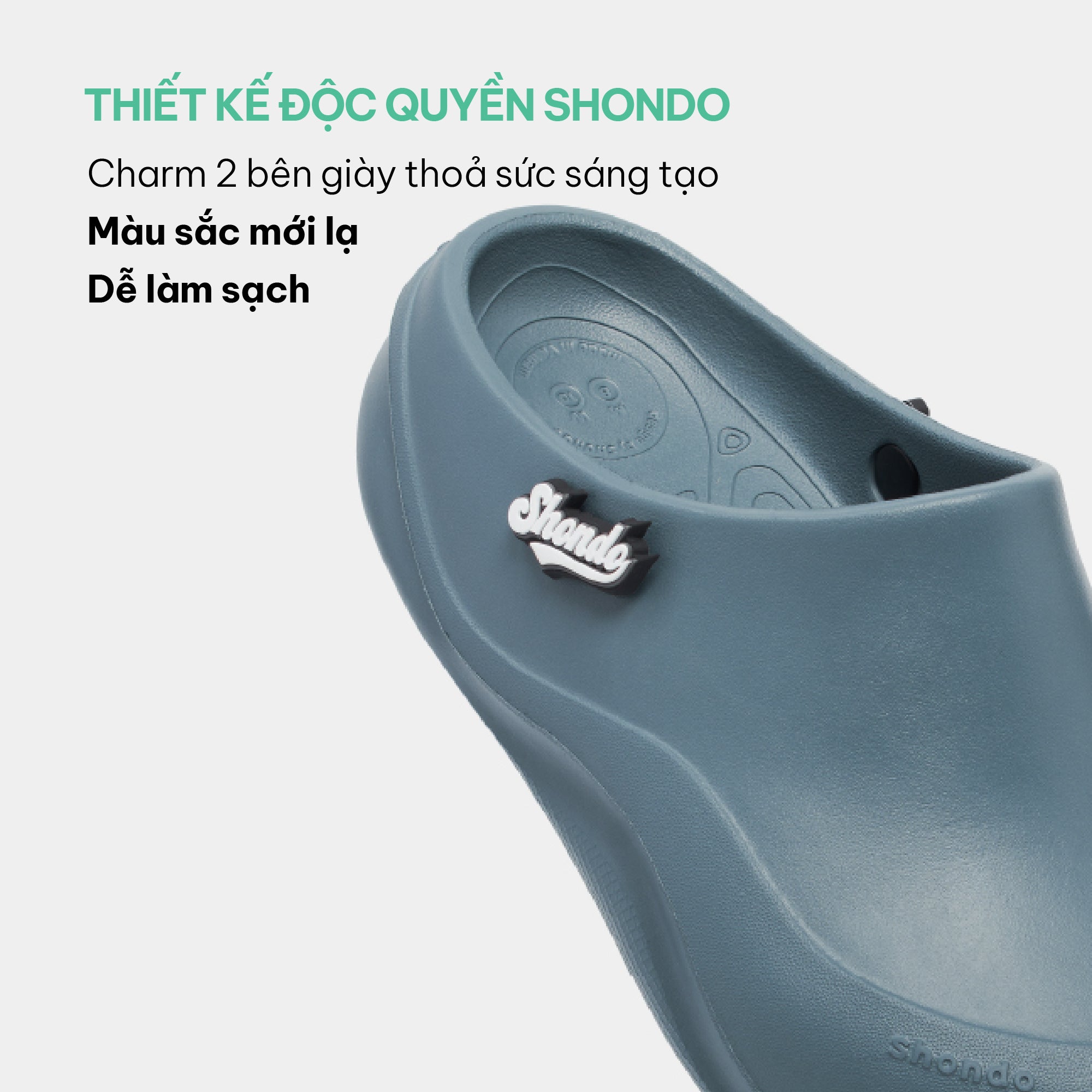 Clog Suke nam nữ nhựa đúc gắn charm xanh dương đậm