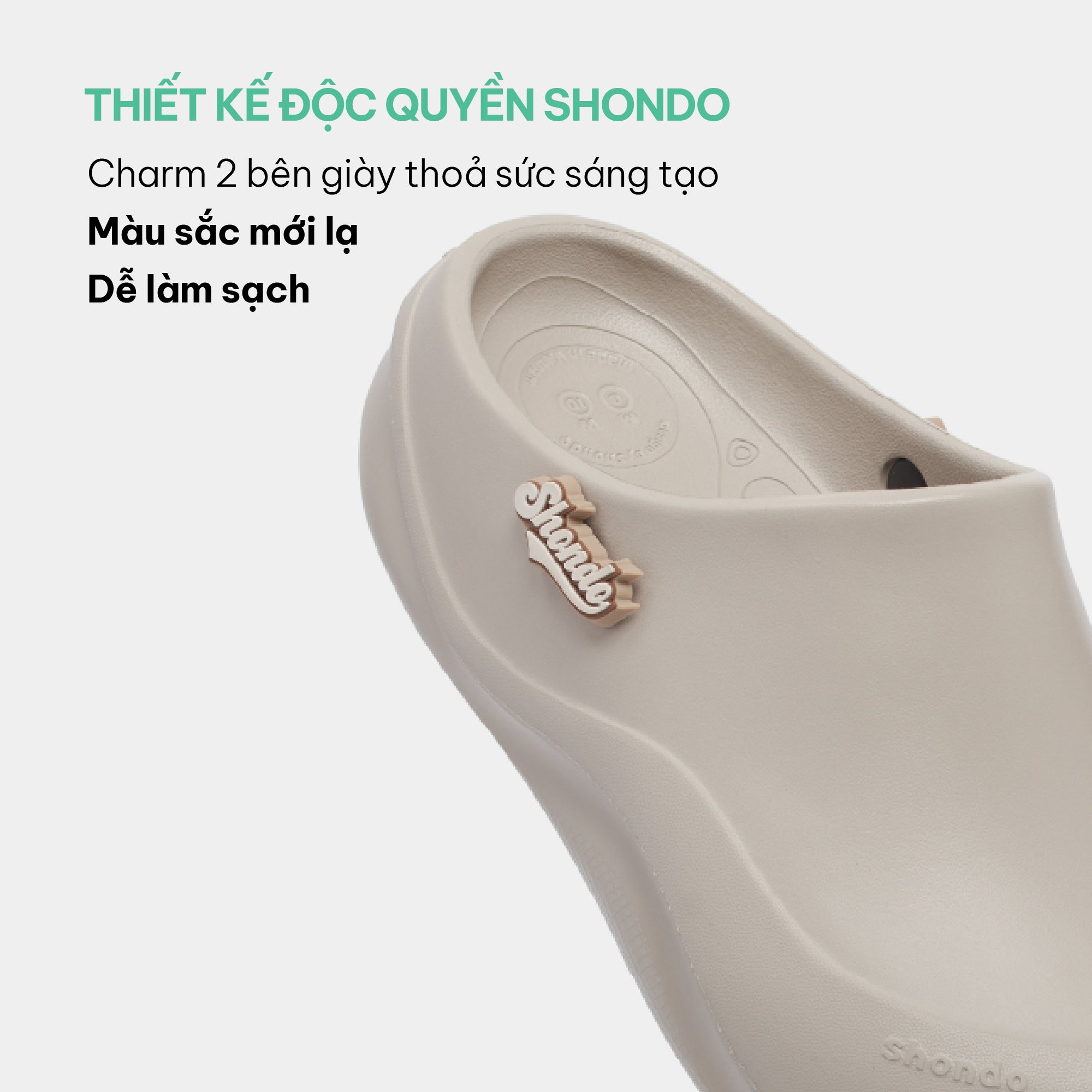 Clog Suke nam nữ nhựa đúc gắn charm nâu nhạt