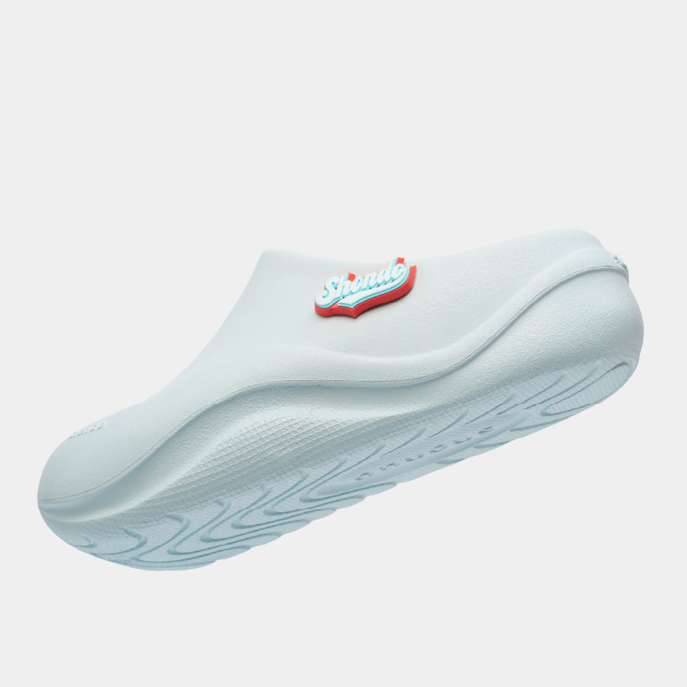 Clog Suke nữ nhựa đúc gắn charm xanh trời