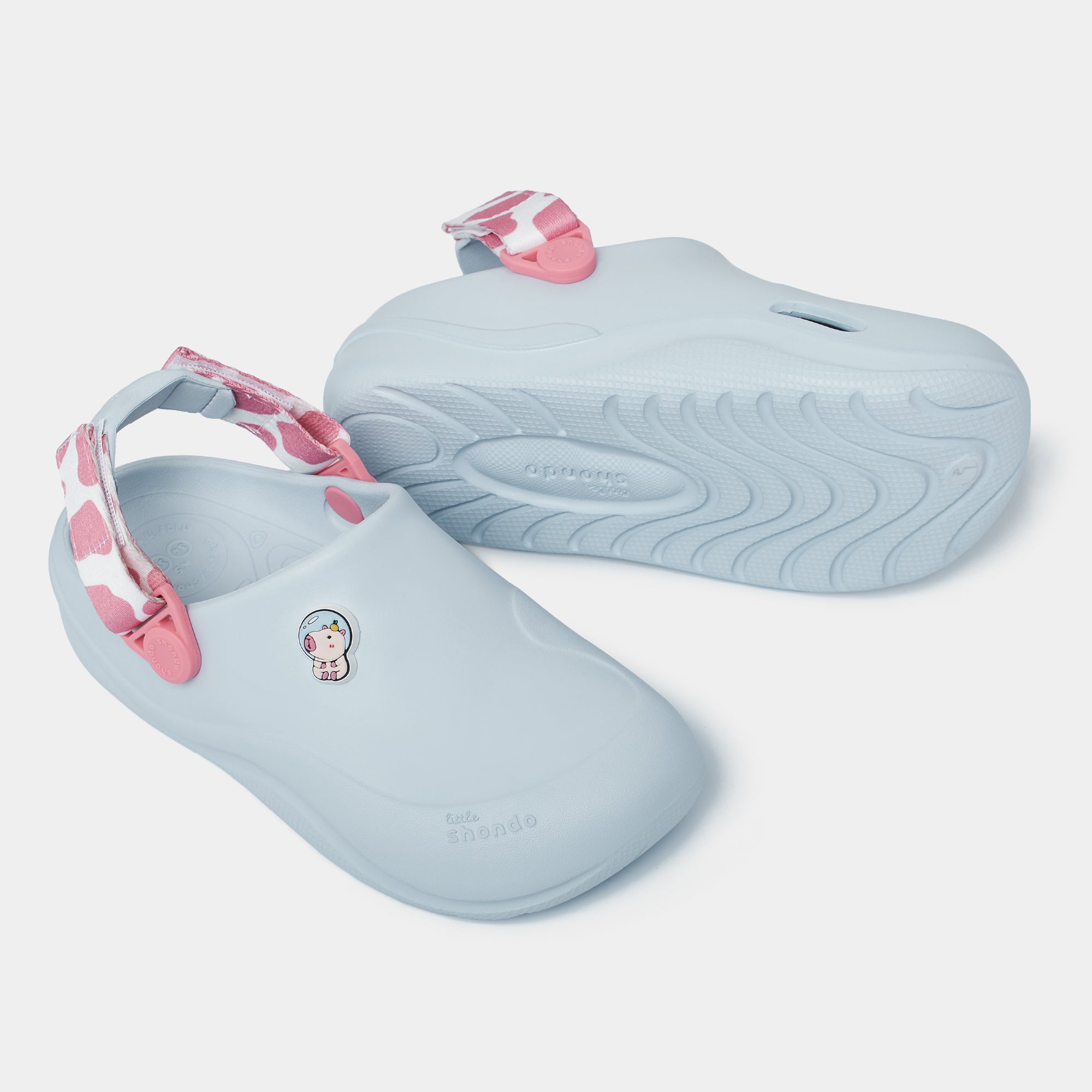 Clog Little Suke bé trai nhựa đúc xanh trời đai bò sữa hồng