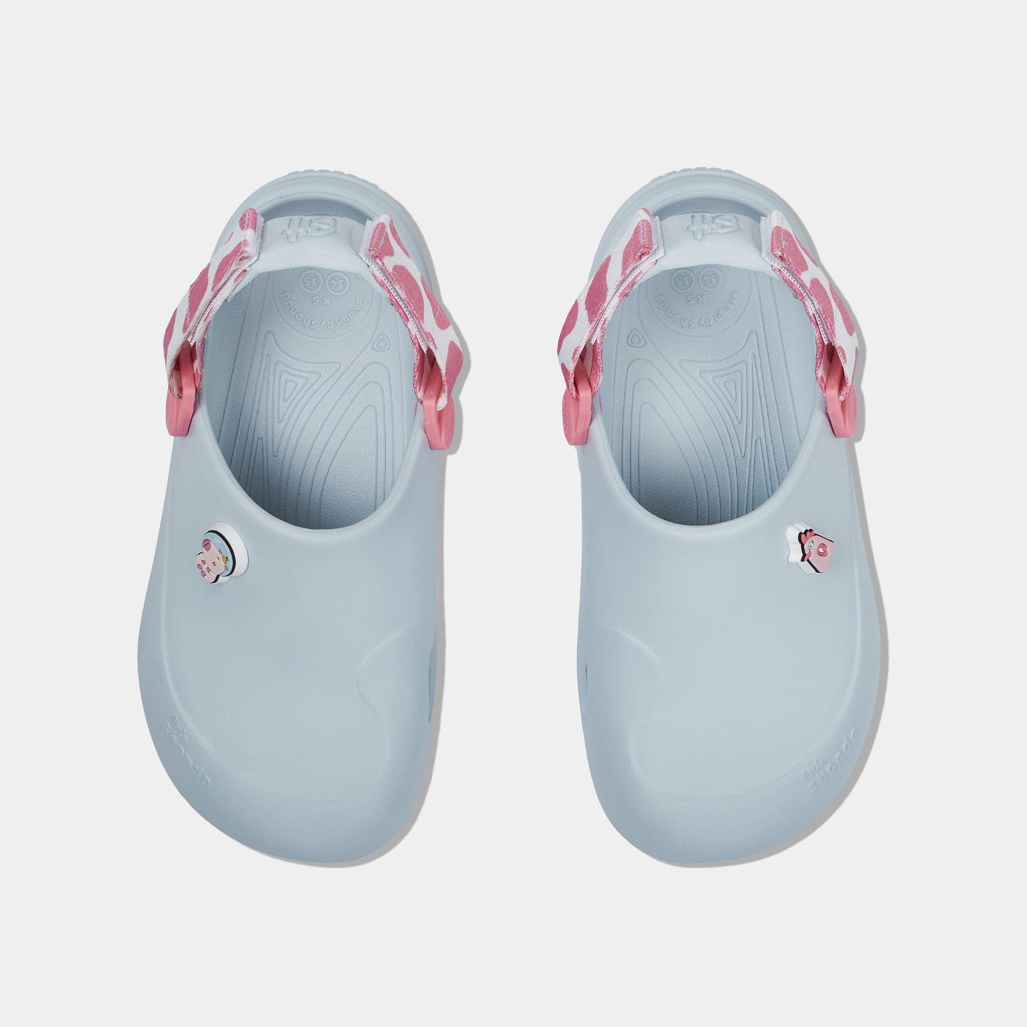 Clog Little Suke bé trai nhựa đúc xanh trời đai bò sữa hồng