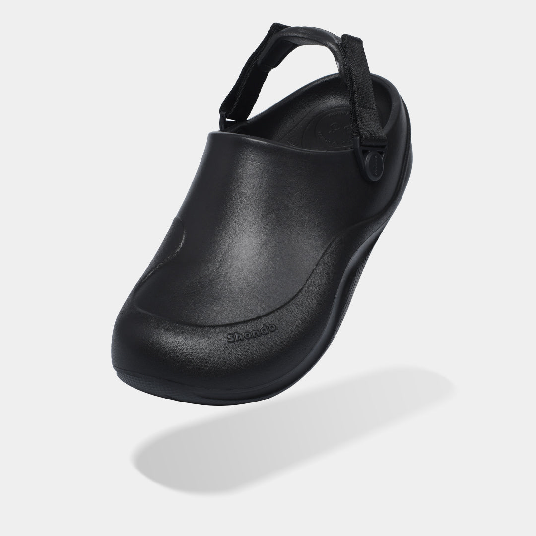 SUKE black plastic molded clogs for men and women
