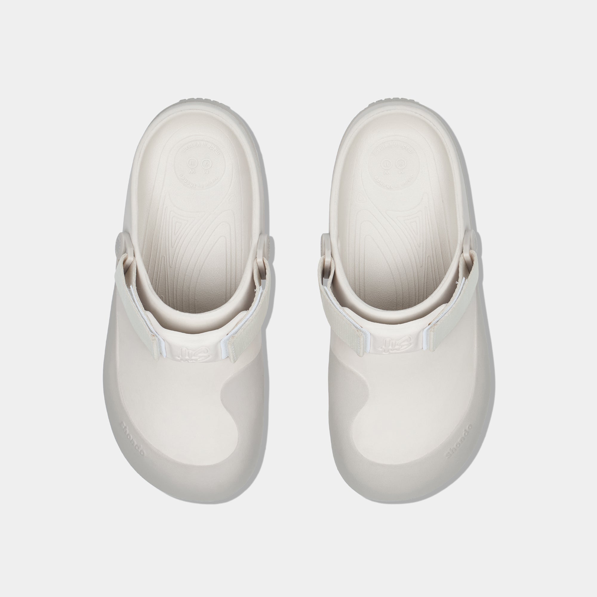 Giày Clog Suke Viền Đế Unisex Trắng Kem